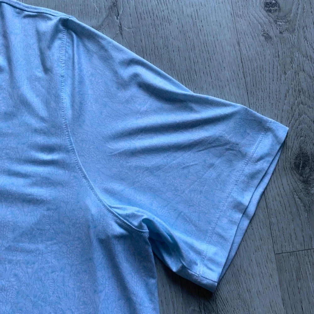 Johnnie-O Clegg Solid Piqué‎ Performance Golf Polo in light blue
